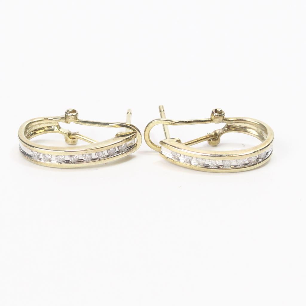 Gold Plated Sterling Silver 2 7g Earrings With Small Diamond Accents Gold Plated Sterling Silver 2 7g Earrings With Small Diamond Accents Property Room