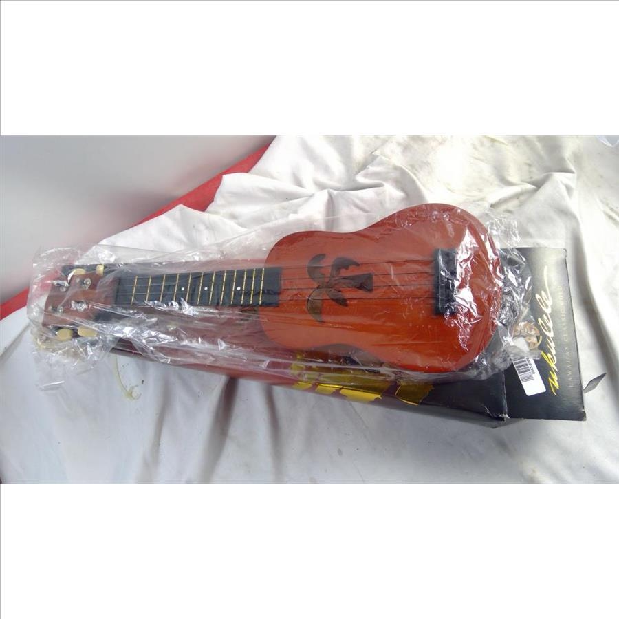 Hawaiian Classic Gold Ukulele Property Room