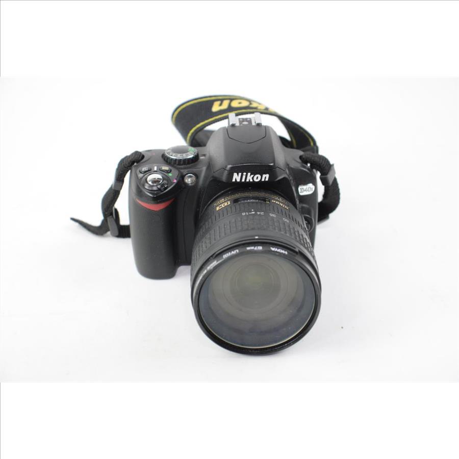Nikon D40x, Nikon AF-S DX Zoom-Nikkor 55-200mm Lens, And Canon Rebel EOS 300D