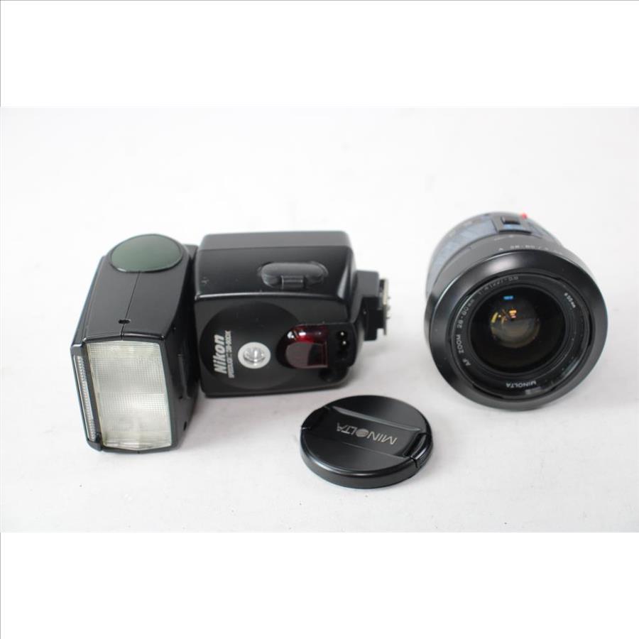 Nikon Flash Attachment And Camera Lens, 2 Pieces Property Room