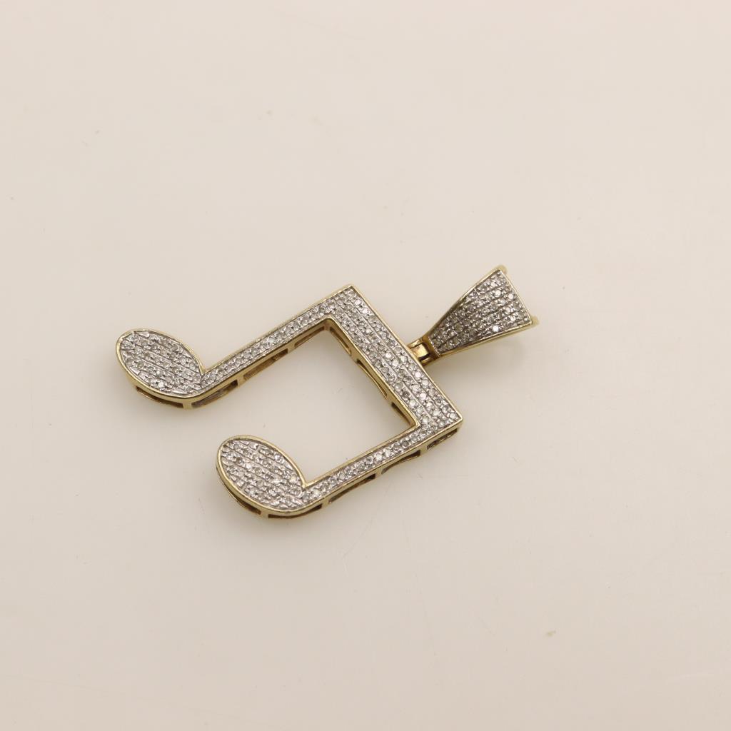 10kt Gold Diamond Musical Note Pendant Property Room