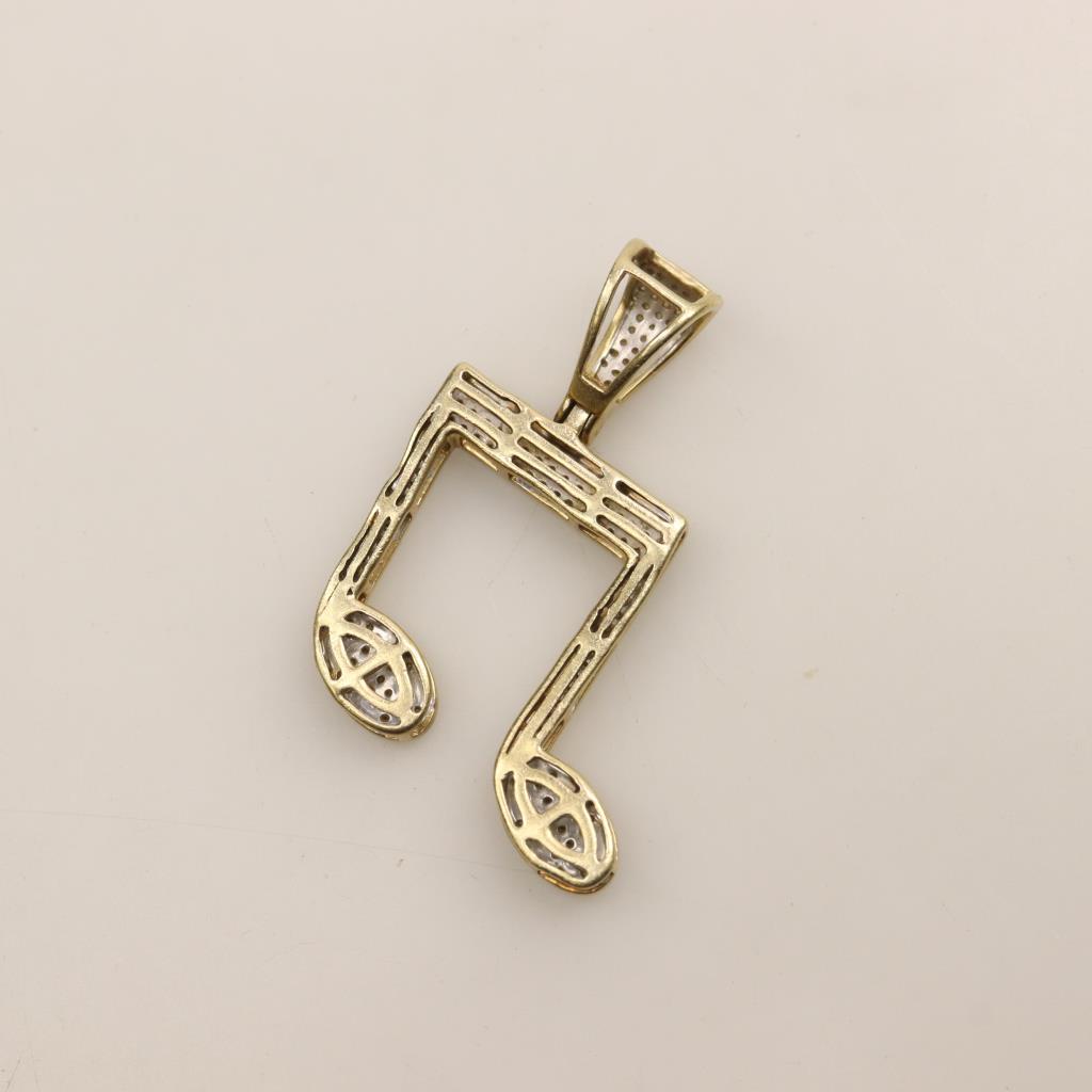 10kt Gold Diamond Musical Note Pendant Property Room