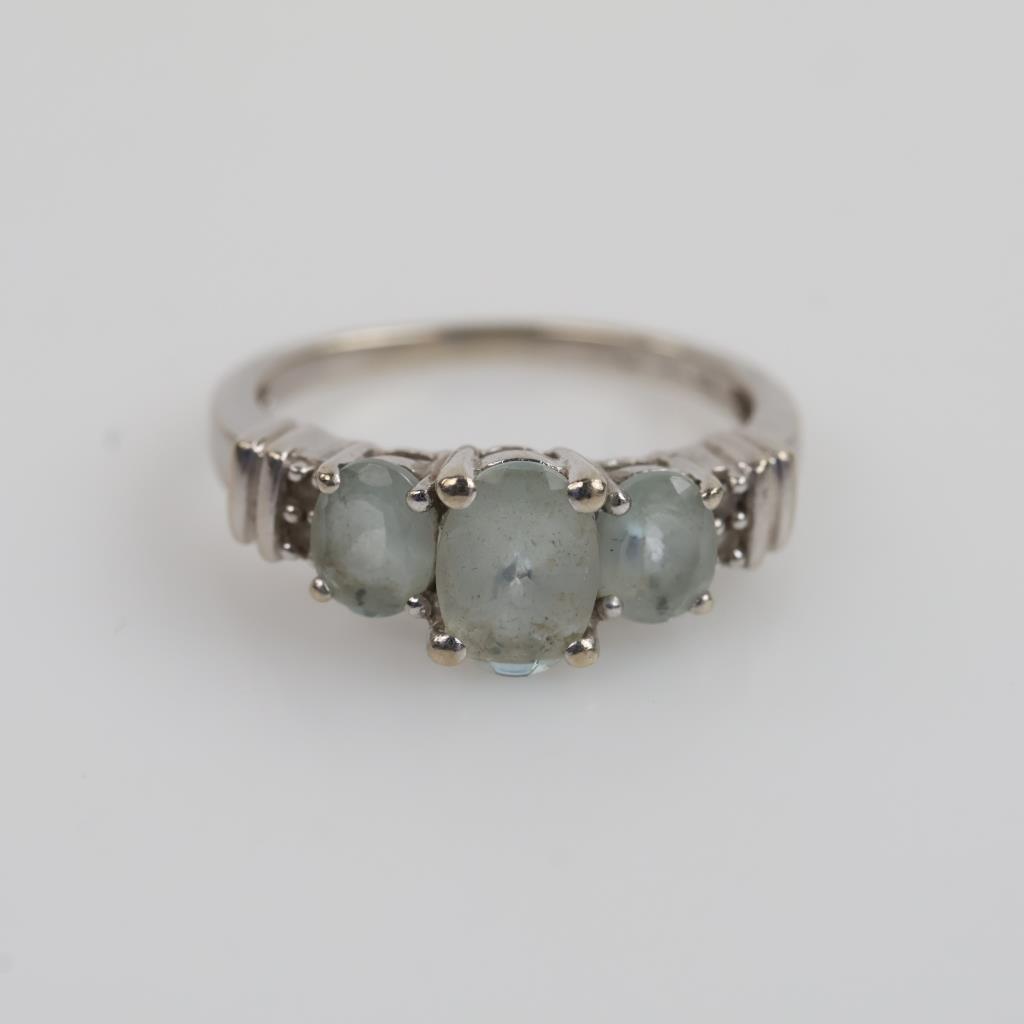 10kt White Gold Blue Stone Clear Stone Accent Ring