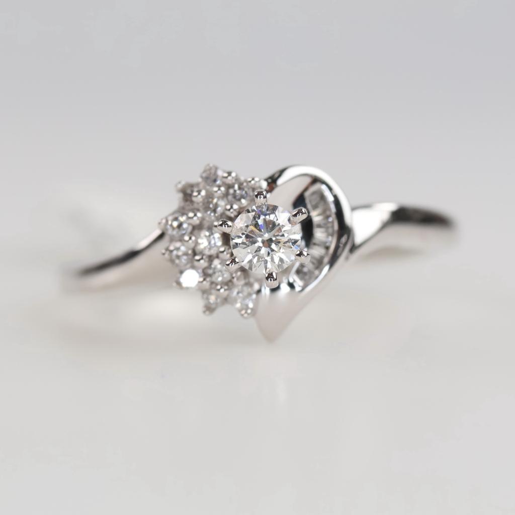 10kt White Gold Diamond And Clear Stone Ring