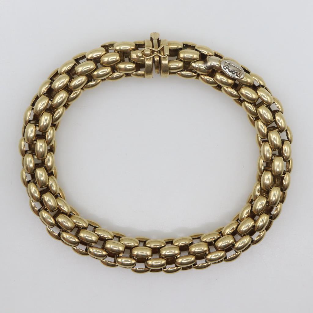 18kt GP Four Strand Panther Style Link Hollow Bracelet Evaluated By Our