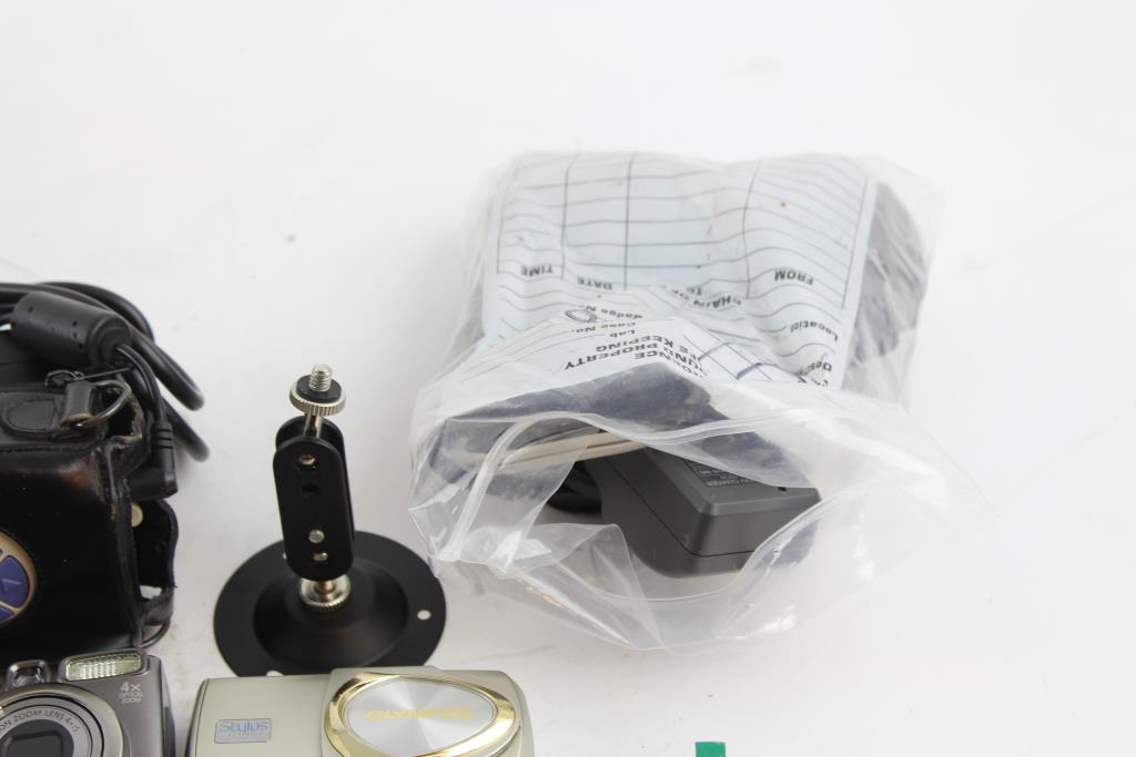 Amazon Kindle, Bunker Hill Security Monitor, Olympus Cameras, And More