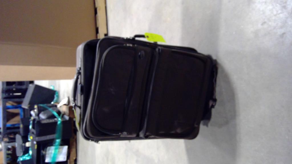 American Tourister Rolling Suitcase Property Room