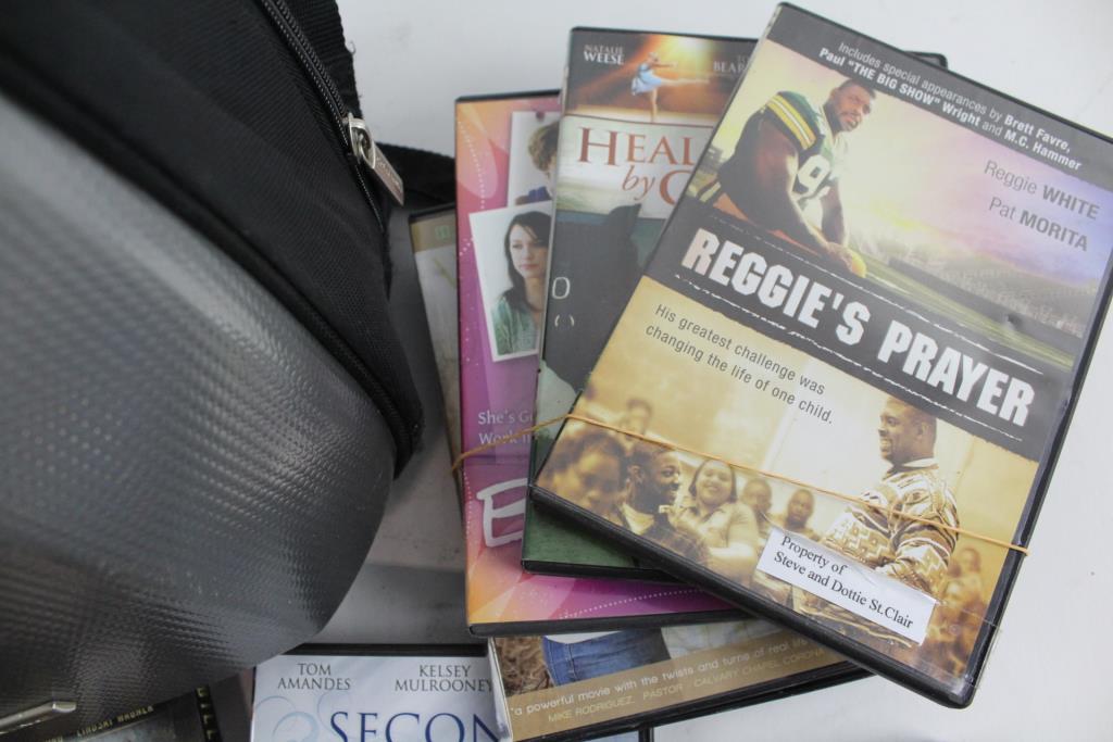 Assorted DVD's In CD-R King Backpack, 8 Pieces | Property Room