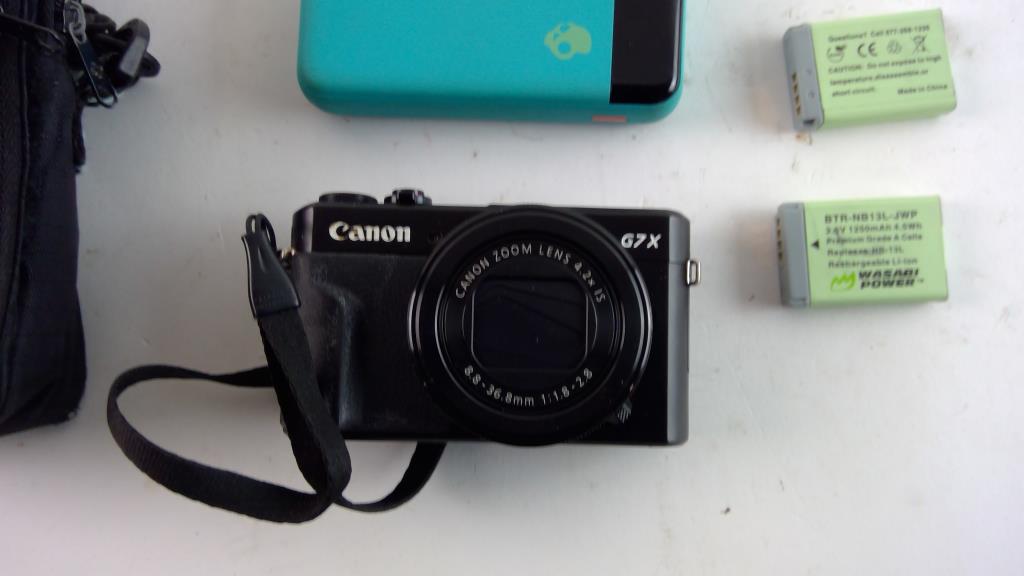 Canon G7X Camera, Skullcandy Portable Charger & Samsonite Case, 3