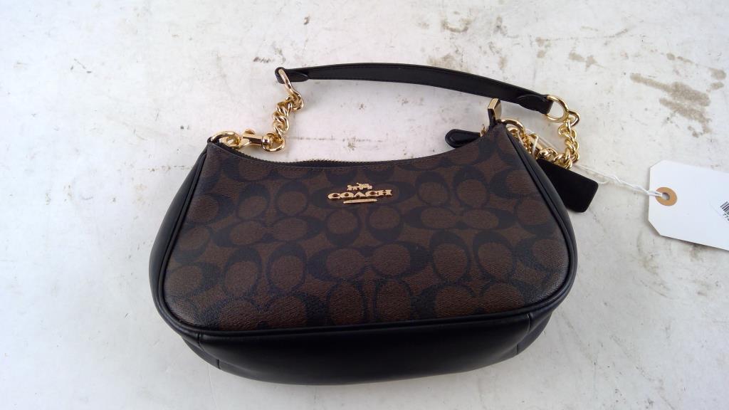 brown Coach handbag for auction in NY