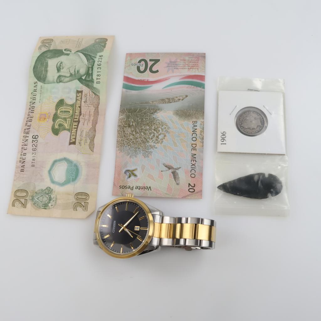 Foreign And U.S. Currency With Citizen Watch