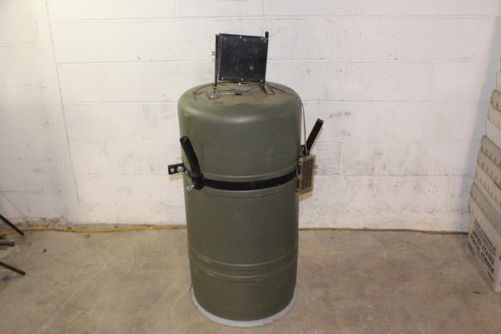 Green Cylinder With Remington Xpress Wild Life Feeder Sold For