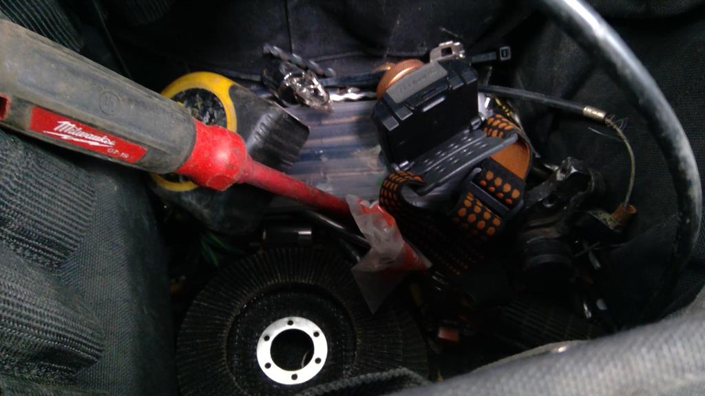 Headlamp, Stanley 16' Tape Measure, Grinder Discs, And More In Greenlee Tool Bag