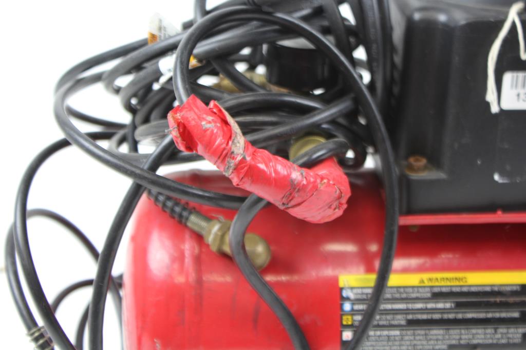 Husky 2 Gal Air Compressor. Property Room