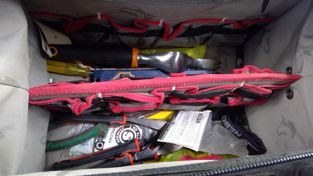 Husky Tool Bag With Level, Crescent Jaw-Locking Pliers, And More Tools