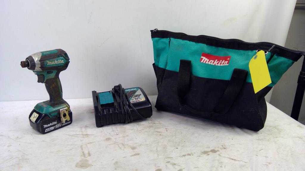 Makita Brushless Cordless Impact Driver, Charger, And Tool Bag