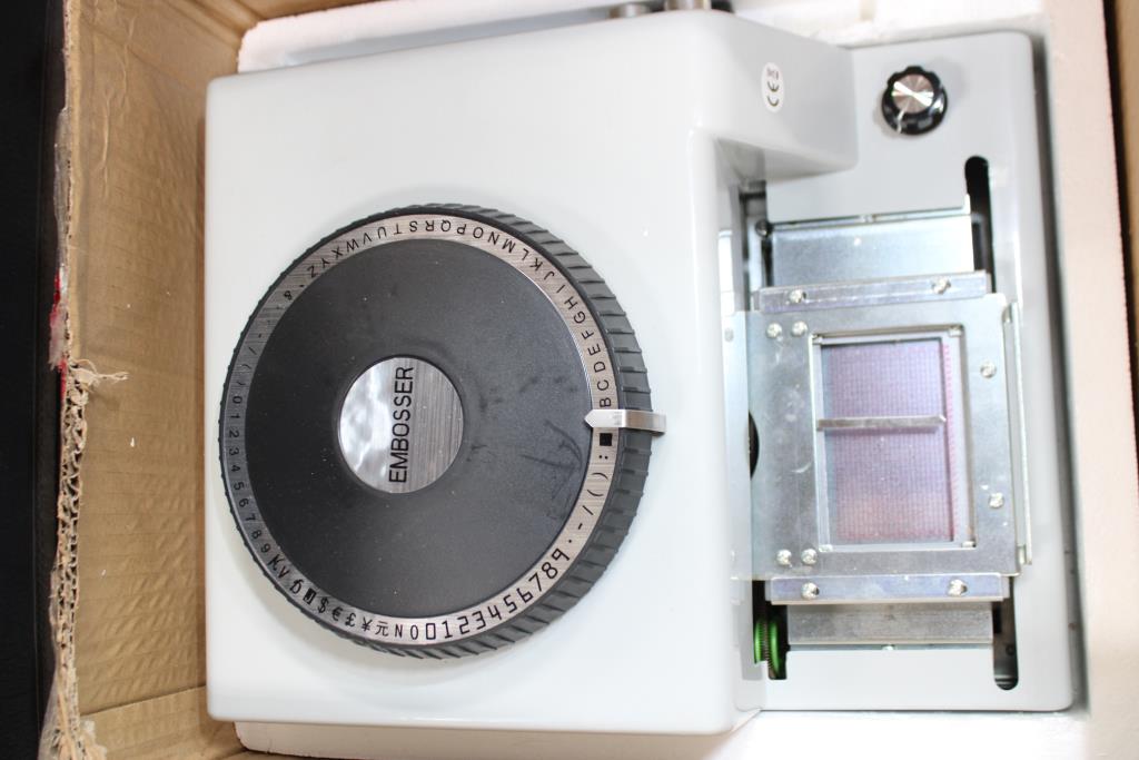 Manual Embossing Machine, Dog Tie-Out Cable, LED Candles, And Mini Vanilla Candles