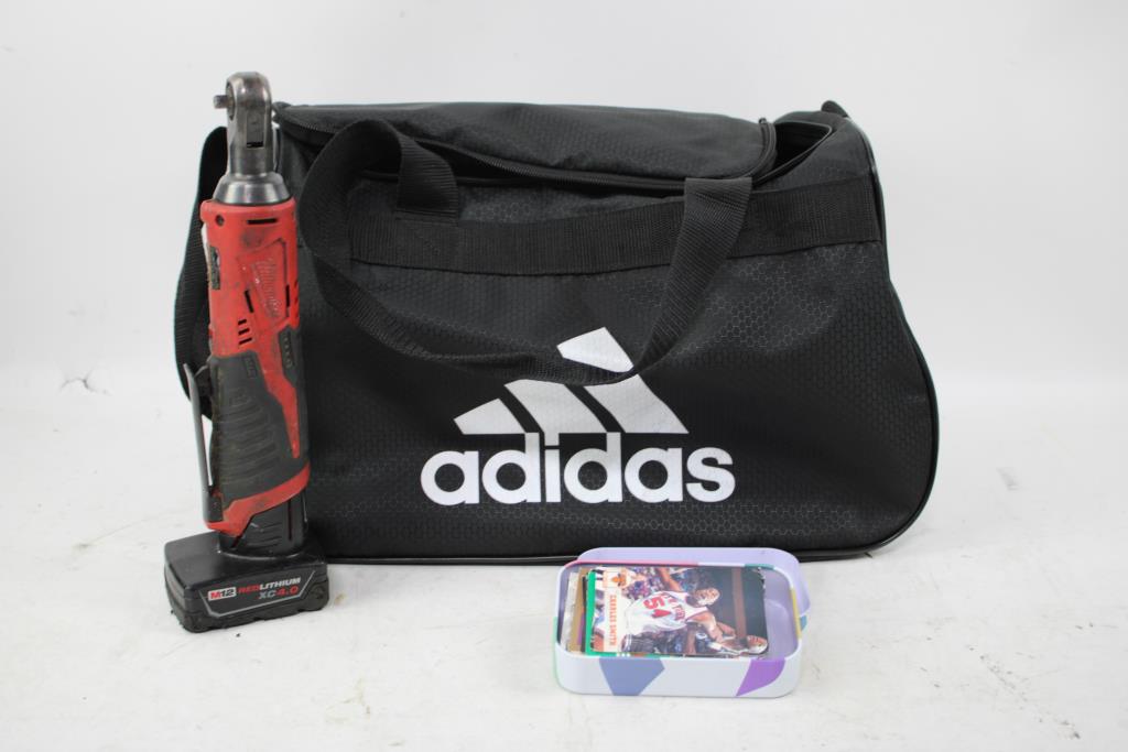 Milwaukee 1/4" Ratchet, Basketball And Football Trading Cards In Adidas Duffel Bag