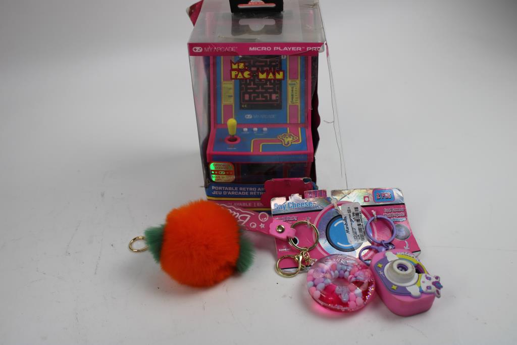 Ms. Pac-Man Portable Arcade, Keychains, Gel Blaster, And More