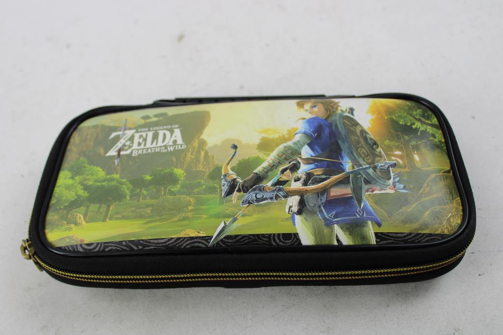 Nintendo Switch And Games In Case