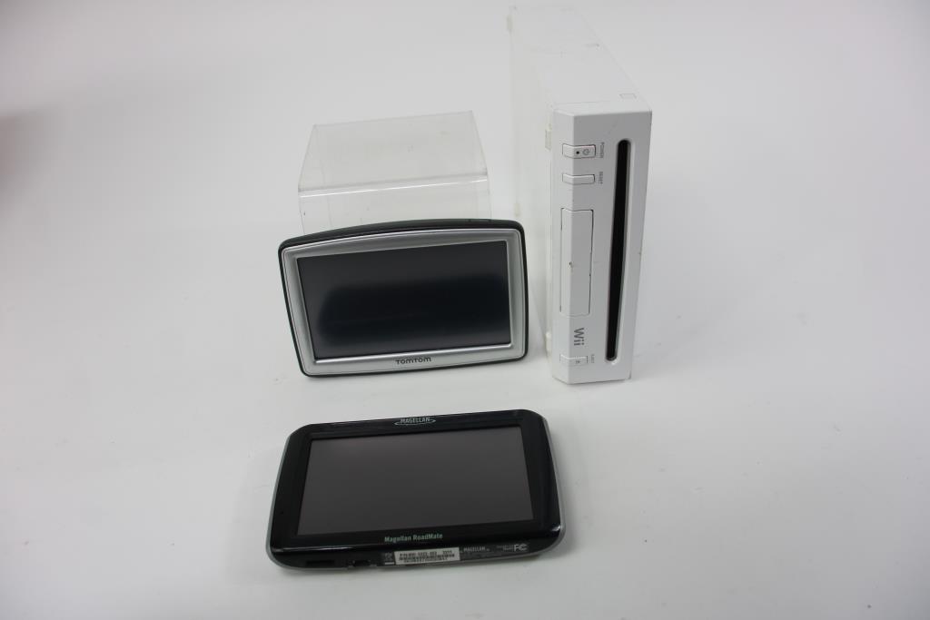 Nintendo Wii Game Console, GPX Portable DVD Player. Tomtom, Magellan, And Furrion GPS Monitors