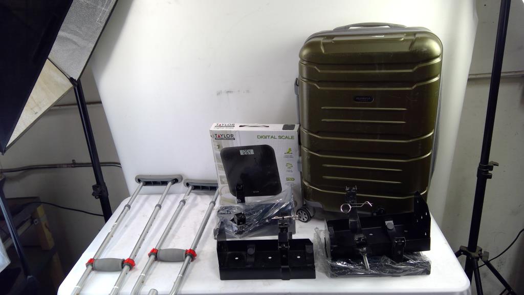 Olympia Suitcase, Digital Bathroom Scale, Crutches, And Running Board Vehicle Brackets