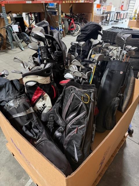 Pallet Of Golf Clubs With Bags