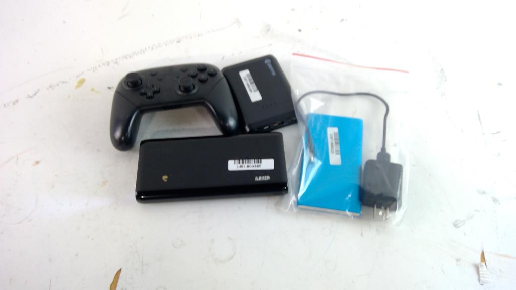Portable Batteries & Nintendo Switch Controller, 4 Pieces Property Room