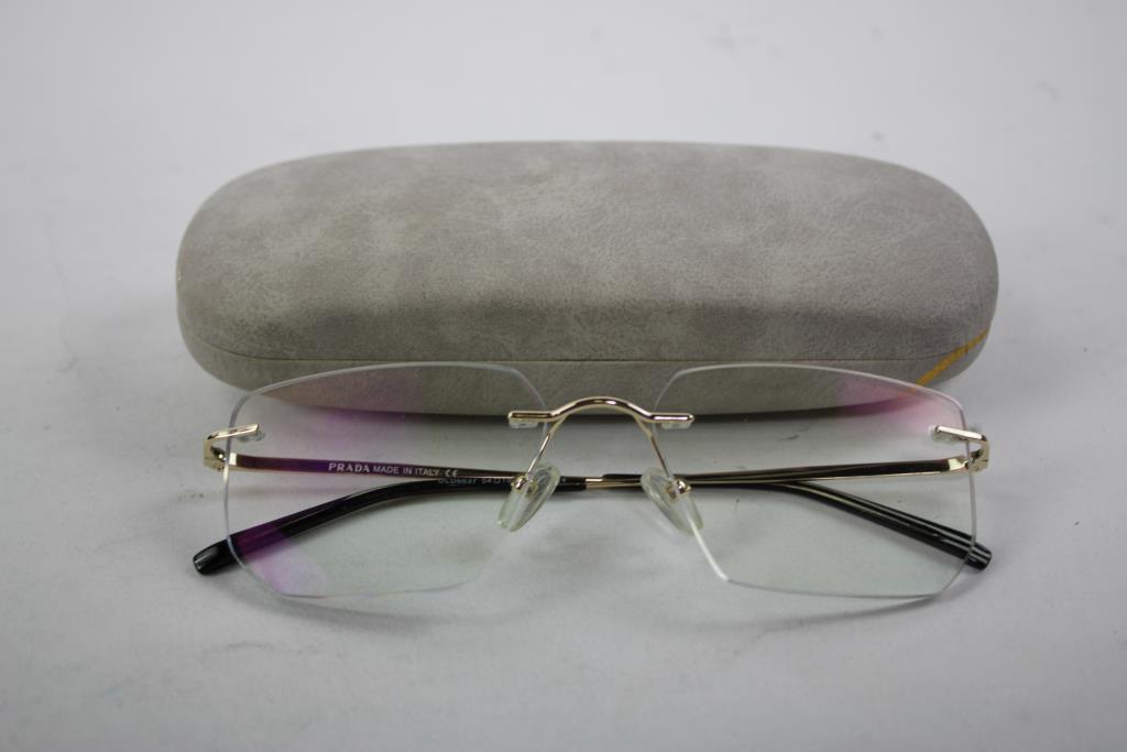 Prada Gold Framed Glasses