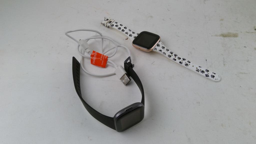 Smartwatches 2 Pieces SOLD FOR PARTS