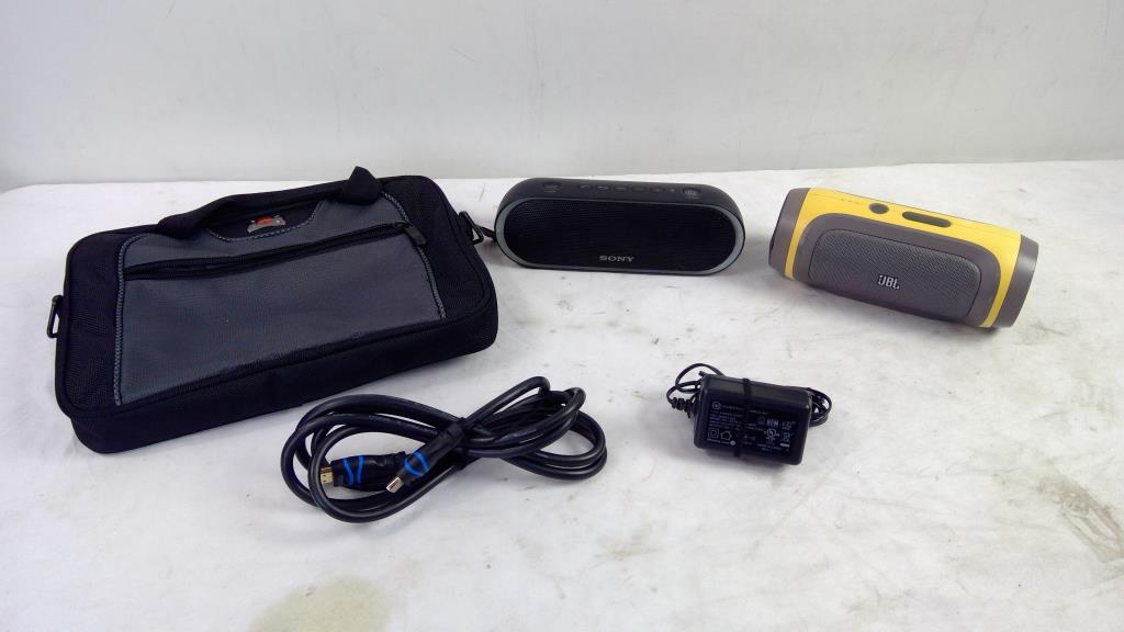Sony, JBL Speakers, Wenger Mini Bag, HDMI With Ethernet Cable, And Power Adapter
