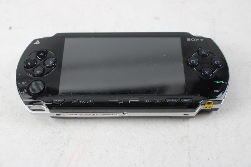 Sony PlayStation Portable, Disc Case With 4 Games