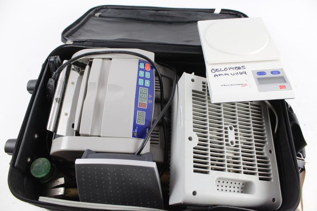 Space Heater, Scales, Bill Counter, And More, Inside Suitcase, 7 Pieces |  Property Room