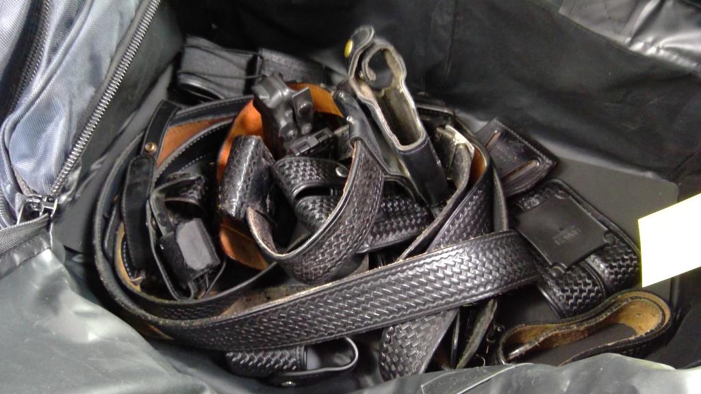Tactical Duty Belts, Gun Holsters And Magazine Pouches In Duffel Bag