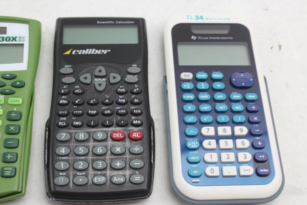 Texas Instruments, Caliber, & Casio Calculators; 4 Pieces Property Room