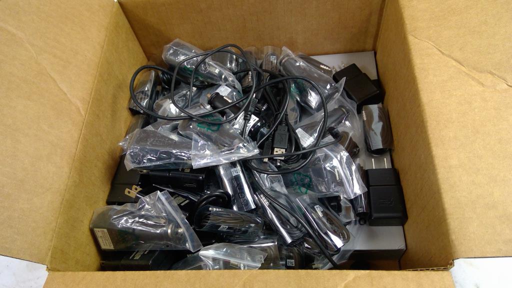 Travel Adapters, Car Adapters, Wired Earbuds, And More Bulk Lot
