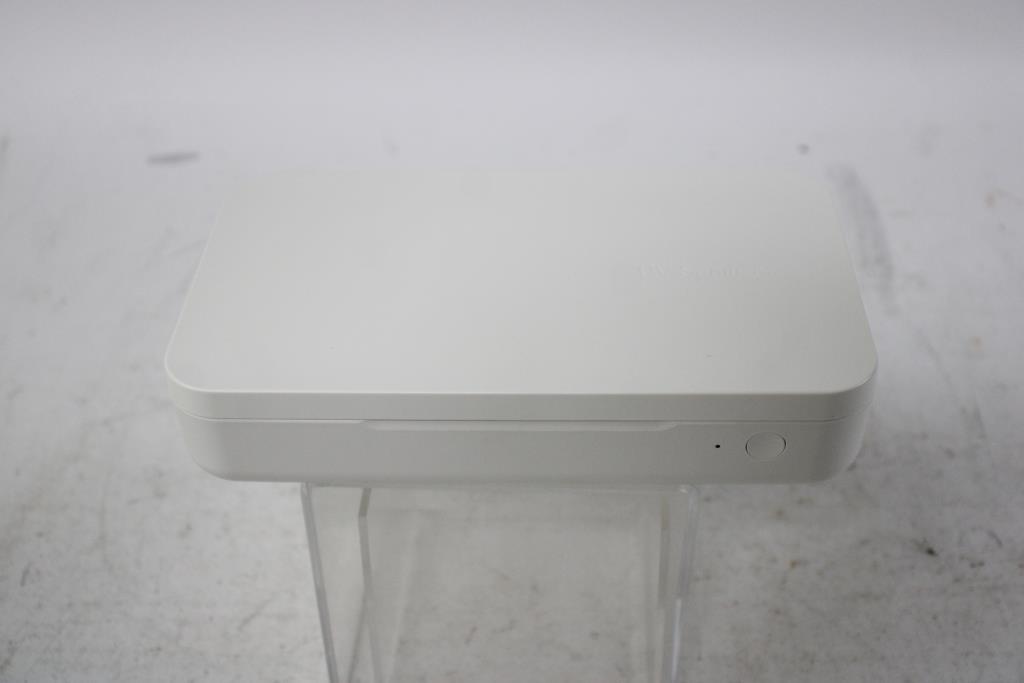 UV Sanitizer With Wireless Charging Property Room