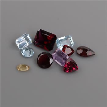 10 Loose Gemstones Including Amethyst, Garnet, Blue Topaz