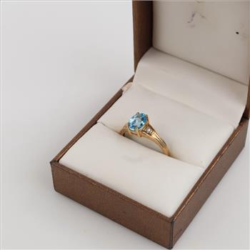 10kt Gold Diamond And Blue Topaz Ring