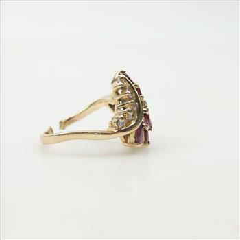 14kt Gold Diamond And Ruby Bypass Ring