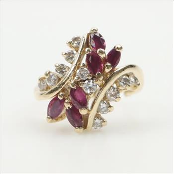 14kt Gold Diamond And Ruby Bypass Ring