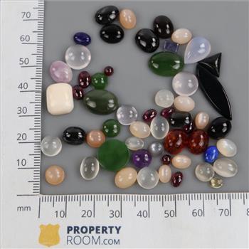 50+ Loose Gemstones Including Moonstone, Onyx, Garnet, Sodalite