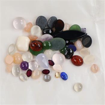 50+ Loose Gemstones Including Moonstone, Onyx, Garnet, Sodalite