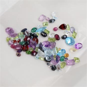 90+ Loose Gemstones Including Amethyst, Citrine, Garnet, Topaz, Emerald, Peridot, Ruby