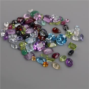 90+ Loose Gemstones Including Amethyst, Citrine, Garnet, Topaz, Emerald, Peridot, Ruby