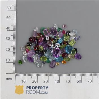 90+ Loose Gemstones Including Amethyst, Citrine, Garnet, Topaz, Emerald, Peridot, Ruby