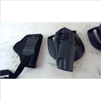 Box Of Pistol Holsters 4 Pieces
