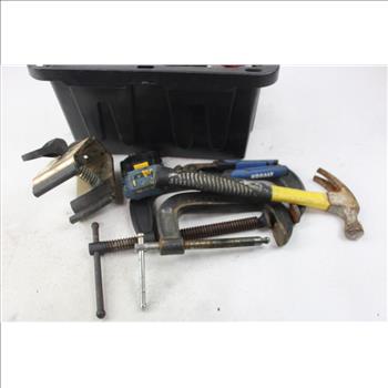 Clamps, Batteries And More In A Black Tote