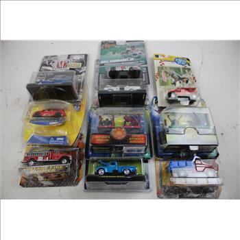 Die-Cast Cars, Bobbleheads, And Duel Masters Collectible Figures, 17 Pieces