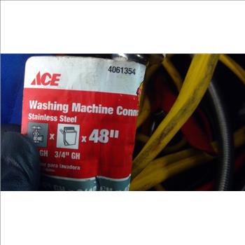 Duffle Bag With Jumper Cables And Washing Machine Hose